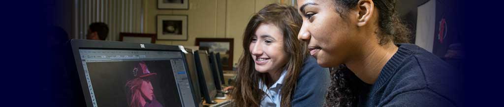 Students drawing in one of FLA's art classes